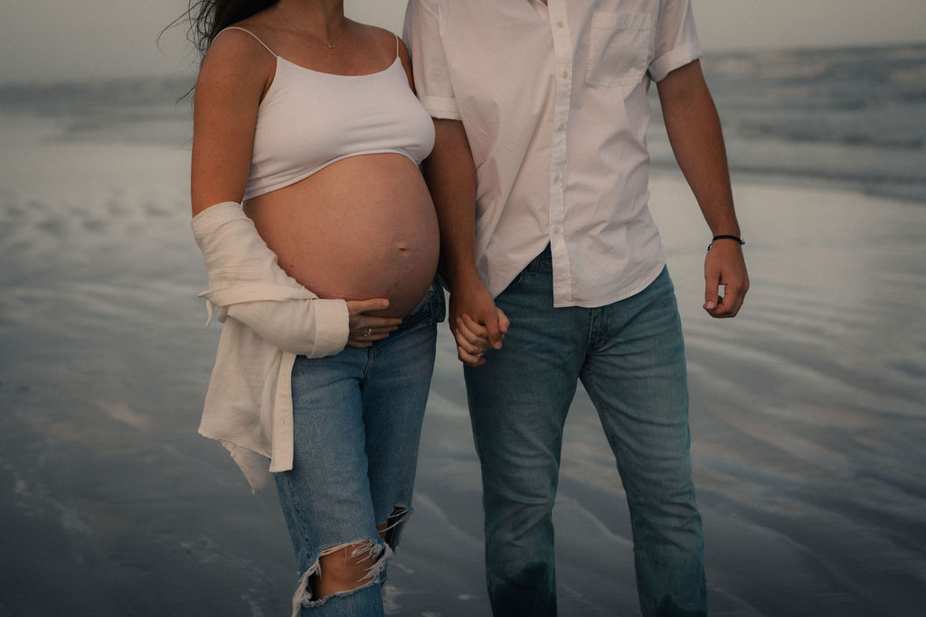 beach couples maternity photoshoot at the beach captured by Los Angeles lifestyle photographer