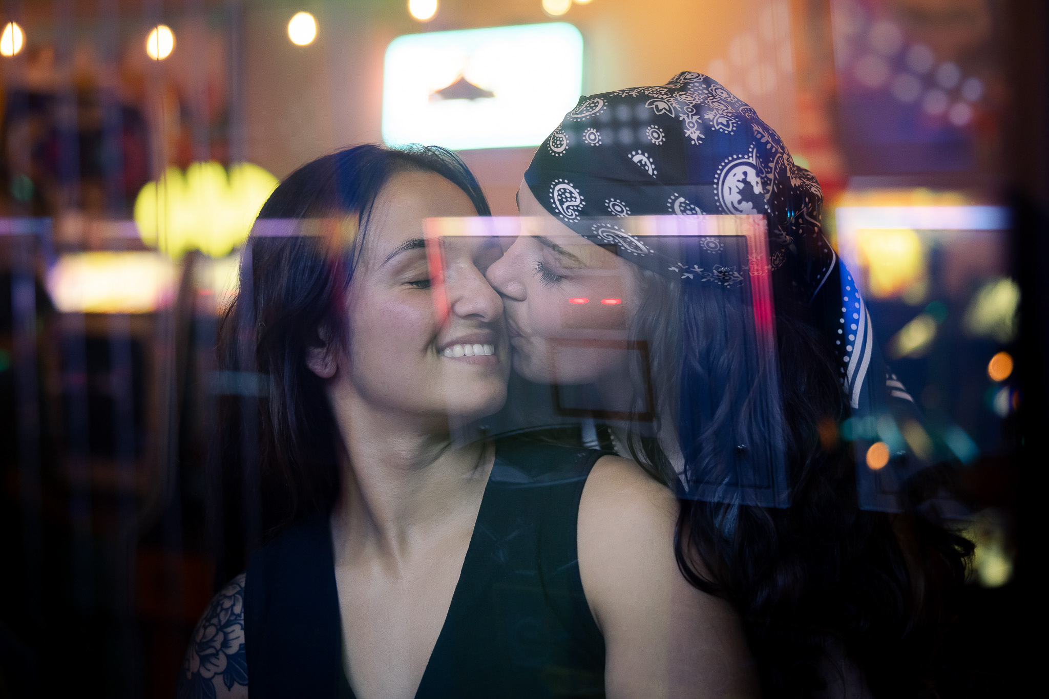 arcade engagement session photo captured by lgbtq friendly Los Angeles wedding photographer