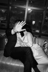 romantic engagement photo of a couple at Tiger Lily ATX bar captured by Texas and Southern California engagement photographer
