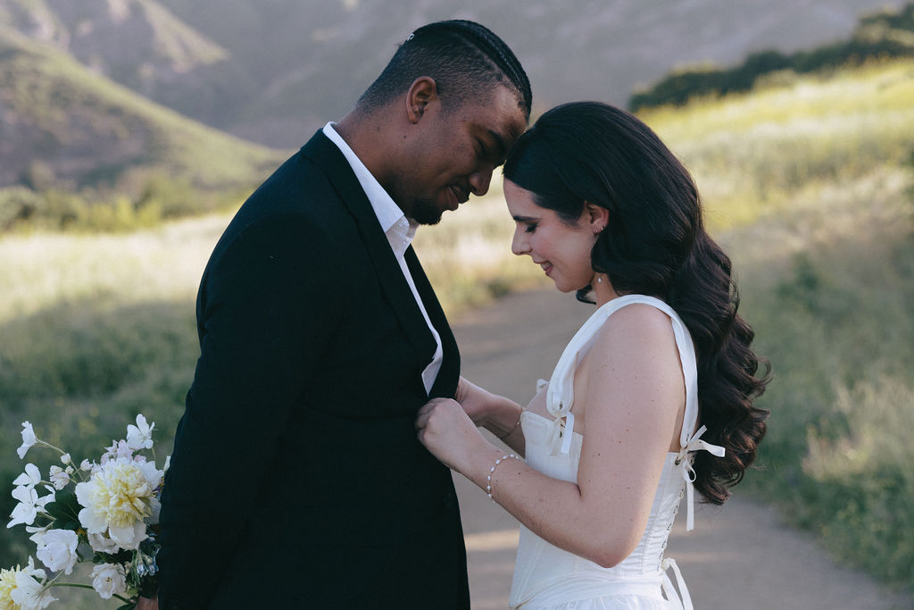 romantic photo of a bride and groom during their intimate elopement in the hills of Malibu, CA captured by Los Angeles film wedding photographer
