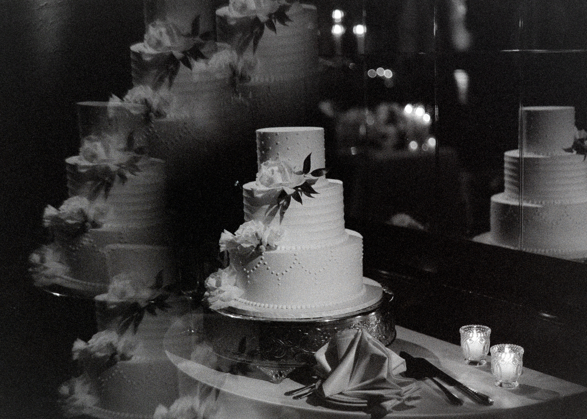 Wedding cake captured on black and white film by Los Angeles documentary wedding photographer