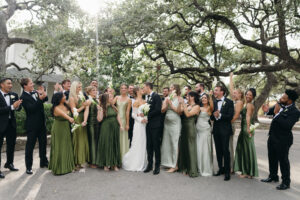 Candid photograph of Hannon & Cooper's wedding party at Mattie's Green Pastures in Austin, TX captured by luxury wedding photographer.