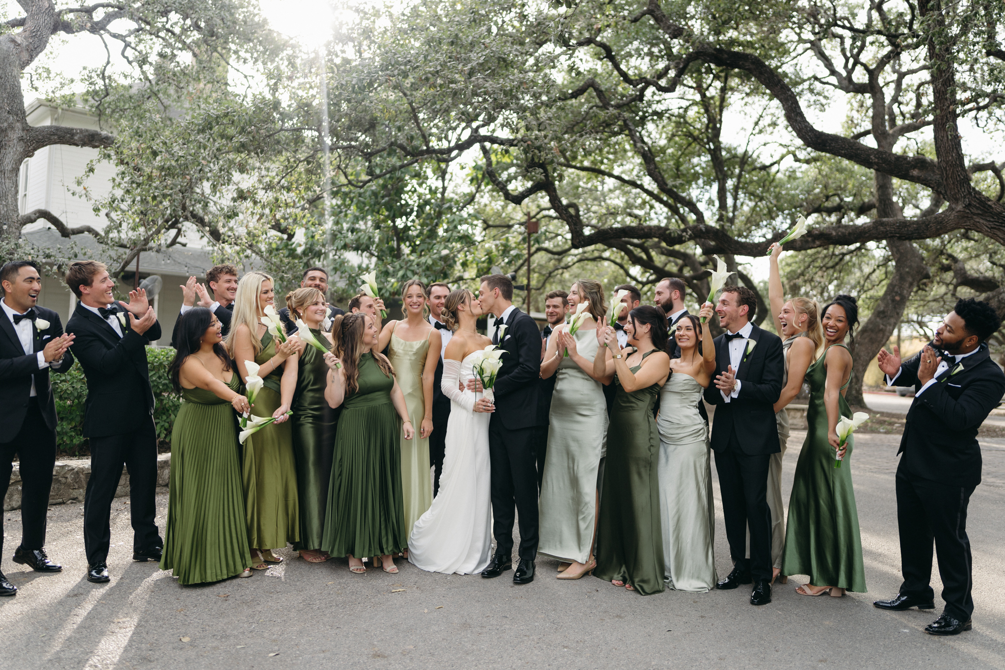 Candid photograph of Hannon & Cooper's wedding party at Mattie's Green Pastures in Austin, TX captured by luxury wedding photographer.