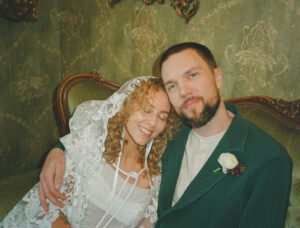 Paul and Lindi in the green room at The Ebell Long Beach captured by California film wedding photographer.